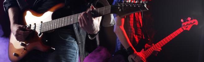 Rock musicians playing at a live concert